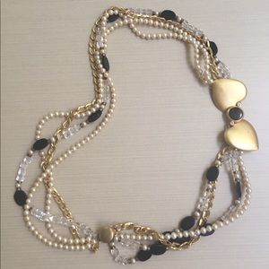 Necklace made of 4 strands-pearls, chain & beads